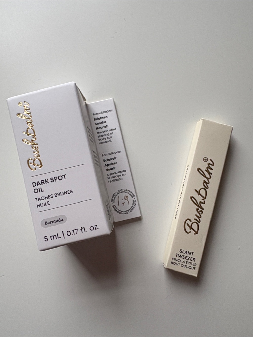 Bushbalm Dark Spot Oil (travel size - 5ml) in the scent Bermuda & Slant Tweezer